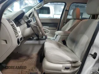 2009 Mercury Mariner Hybrid with VIN 4M2CU29339KJ14631, listed as a Copart auction lot 71823674 with 190,853 mi miles and Salvage title. Bid and sale history available at DreamBid. Image 7.