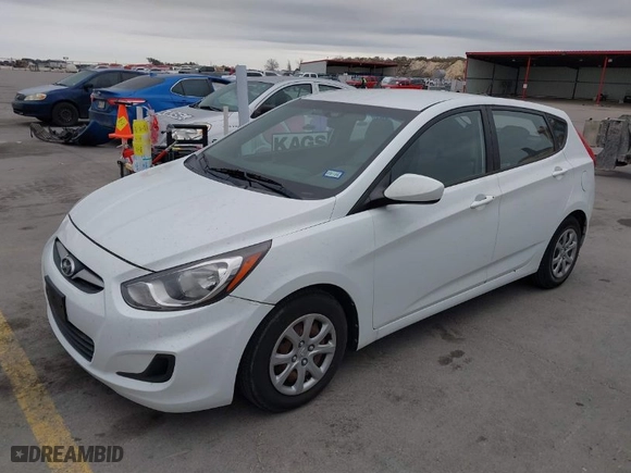 2012 Hyundai Accent GS with VIN KMHCT5AE4CU051716, listed as a IAAI auction lot 41692287 with 173,861 mi miles. Bid and sale history available at carsss.com. Image 2.