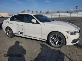 2017 BMW 3 Series 330e iPerformance with VIN WBA8E1C53HK480307, listed as a Copart auction lot 47618215 with 74,924 mi miles and Salvage Title. Bid and sale history available at carsss.com. Image 4.