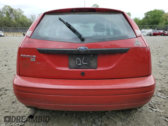 2007 Ford Focus S with VIN 1FAFP31N57W242751, listed as a Copart auction lot 54691345 with 137,224 mi miles and Salvage title. Bid and sale history available at DreamBid. Image 6.
