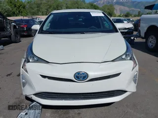 2017 Toyota Prius Two with VIN JTDKARFUXH3536565, listed as a IAAI auction lot 42374515 with 125,240 mi miles and . Bid and sale history available at DreamBid. Image 12.