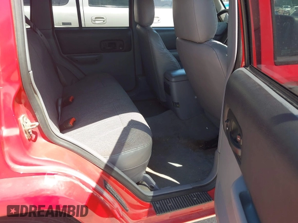 1998 Jeep Cherokee Sport with VIN 1J4FT68S2WL256846, listed as a IAAI auction lot 41998490 with 198,936 mi miles. Bid and sale history available at carsss.com. Image 8.