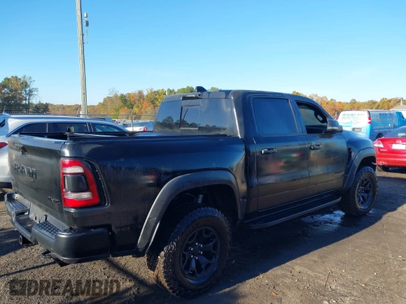 2021 Ram 1500 TRX with VIN 1C6SRFU90MN803580, listed as a IAAI auction lot 40689804 with 54,040 mi miles. Bid and sale history available at carsss.com. Image 4.