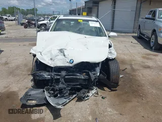 2006 BMW 3 Series 325xi with VIN WBAVD13556KV10507, listed as a IAAI auction lot 42515516 with 159,034 mi miles and . Bid and sale history available at DreamBid. Image 6.