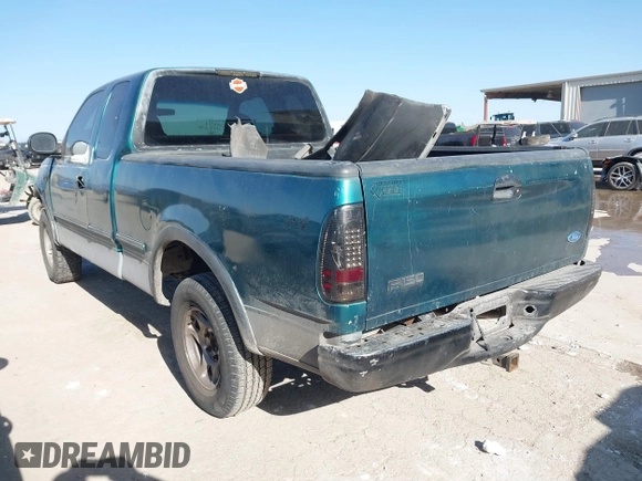 1997 Ford F-150 XL with VIN 1FTEX18L0VKC14651, listed as a IAAI auction lot 41228875 with 251,074 mi miles. Bid and sale history available at carsss.com. Image 3.