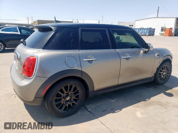 2017 MINI Hardtop 4 Door Cooper with VIN WMWXU1C53H2E18438, listed as a Copart auction lot 52871475 with 133,235 mi miles and Salvage Title. Bid and sale history available at DreamBid. Image 3.