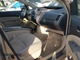 2005 Toyota Prius z VIN JTDKB20UX53056020, wystawiony jako IAAI lot #41829041 z przebiegiem 224 762 mil mil oraz . Historia ofert i sprzedaży dostępna na DreamBid. Obrazek 5.