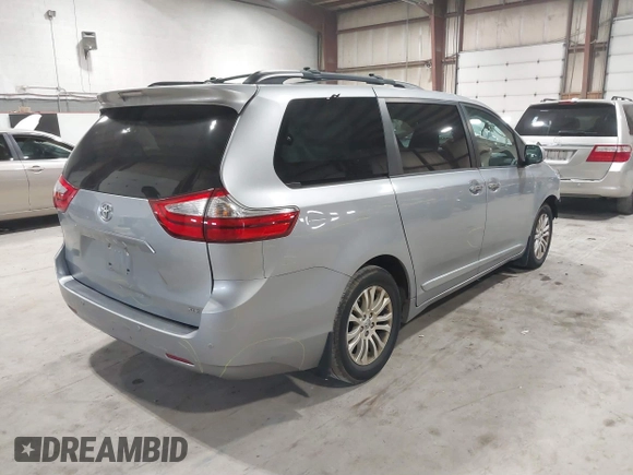 2016 Toyota Sienna XLE with VIN 5TDYK3DC7GS748075, listed as a IAAI auction lot 41795318 with 153,913 mi miles. Bid and sale history available at carsss.com. Image 4.
