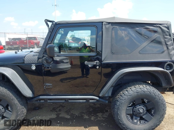 2015 Jeep Wrangler Freedom Edition с VIN 1C4AJWAG0FL520027, выставлен на аукционе IAAI как лот 42585222 с пробегом 78 980 миль миль и . История ставок и продаж доступна на DreamBid. Изображение 14.