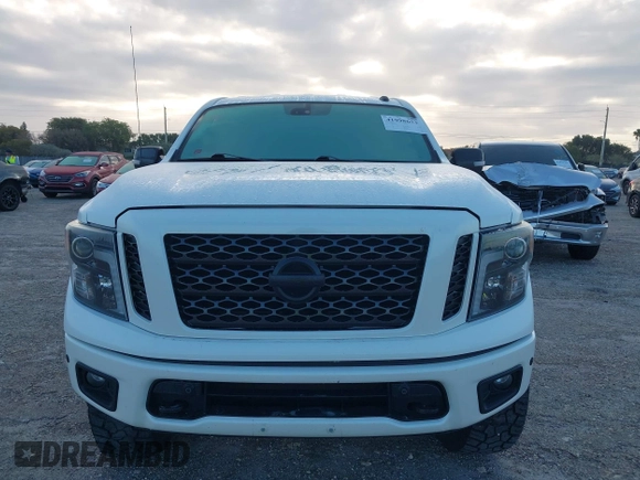 2019 Nissan Titan Pro-4X z VIN 1N6AA1E52KN534356, wystawiony jako IAAI lot #41998653 z przebiegiem 95 052 mil mil oraz . Historia ofert i sprzedaży dostępna na DreamBid. Obrazek 13.