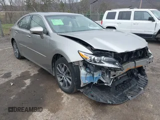2017 Lexus ES 300h with VIN JTHBW1GG2H2147869, listed as a IAAI auction lot 41999737 with 88,008 mi miles and . Bid and sale history available at DreamBid. Image 1.