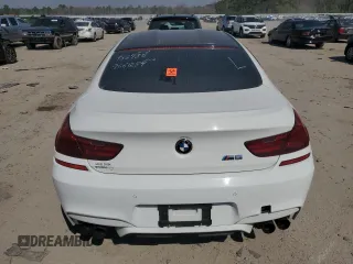 2014 BMW M6 z VIN WBS6C9C57ED466935, wystawiony jako Copart lot #46622715 z przebiegiem 78 015 mil mil oraz Czysty tytuł • Clean title. Historia ofert i sprzedaży dostępna na DreamBid. Obrazek 6.