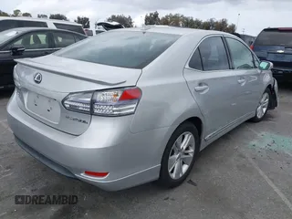 2010 Lexus HS 250h z VIN JTHBB1BA9A2017446, wystawiony jako IAAI lot #42119697 z przebiegiem 156 642 mil mil oraz . Historia ofert i sprzedaży dostępna na DreamBid. Obrazek 4.