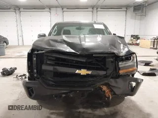 2016 Chevrolet Silverado 1500 LT with VIN 1GCVKREC0GZ303387, listed as a IAAI auction lot 41978237 with 123,692 mi miles and . Bid and sale history available at DreamBid. Image 12.