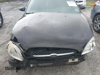 2003 Ford Taurus SES Standard with VIN 1FAFP55223A152802, listed as a IAAI auction lot 42390857 with 141,673 mi miles and . Bid and sale history available at DreamBid. Image 16.