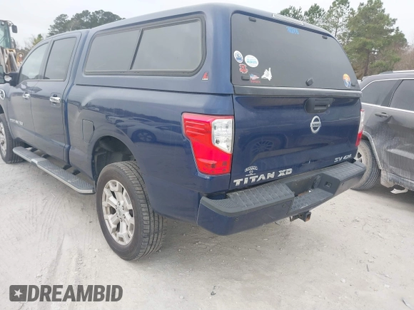 2019 Nissan Titan XD SV with VIN 1N6BA1F49KN506712, listed as a IAAI auction lot 41661789 with 107,972 mi miles. Bid and sale history available at carsss.com. Image 3.