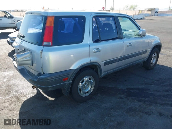 1999 Honda CR-V EX with VIN JHLRD1861XC007657, listed as a IAAI auction lot 42004759 with 180,078 mi miles. Bid and sale history available at carsss.com. Image 4.