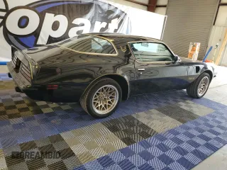 1975 Pontiac Firebird z VIN 2W87S5N561452, wystawiony jako Copart lot #64986614 z przebiegiem 73 434 mil mil oraz Tytuł czysty. Historia ofert i sprzedaży dostępna na DreamBid. Obrazek 3.