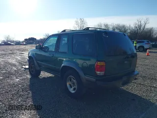 1999 Ford Explorer Sport with VIN 1FMYU24E6XUB80611, listed as a IAAI auction lot 41858826 with 209,656 mi miles and . Bid and sale history available at DreamBid. Image 3.