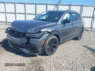 2024 Volkswagen Tiguan SE R-Line Black with VIN 3VVCB7AX2RM114556, listed as a IAAI auction lot 41887373 with 7,013 mi miles and . Bid and sale history available at DreamBid. Image 17.