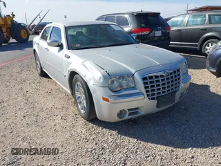 2006 Chrysler 300 C with VIN 2C3KA63H46H154990, listed as a IAAI auction lot 42004790 with 233,673 mi miles. Bid and sale history available at carsss.com. Image 1.
