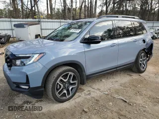 2022 Honda Passport Elite z VIN 5FNYF8H01NB002305, wystawiony jako Copart lot #49740525 z przebiegiem 37 134 mil mil oraz Szkody całkowita. Historia ofert i sprzedaży dostępna na DreamBid. Obrazek 1.