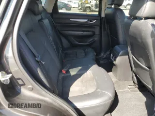 2017 Mazda CX-5 Touring with VIN JM3KFACLXH0131443, listed as a Copart auction lot 48524845 with 102,731 mi miles and Salvage Title. Bid and sale history available at carsss.com. Image 12.