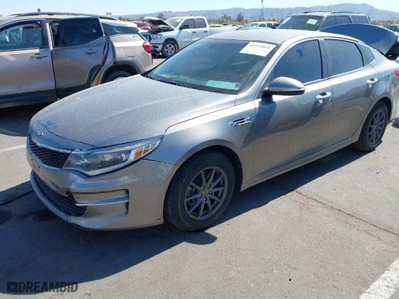 2017 Kia Optima LX with VIN 5XXGT4L30HG149506, listed as a IAAI auction lot 41591864 with 137,087 mi miles. Bid and sale history available at carsss.com. Image 2.