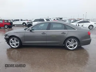 2014 Audi A6 Premium Plus z VIN WAUGFAFC3EN087176, wystawiony jako IAAI lot #42117602 z przebiegiem 53 571 mil mil oraz . Historia ofert i sprzedaży dostępna na DreamBid. Obrazek 15.