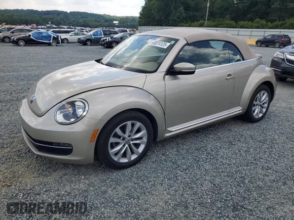 2015 Volkswagen Beetle with VIN 3VW5A7AT9FM815899, listed as a Copart auction lot 63074125 with 77,214 mi miles and Salvage title. Bid and sale history available at DreamBid. Image 1.