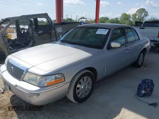 2003 Mercury Grand Marquis LS Premium z VIN 2MEFM75W83X631023, wystawiony jako IAAI lot #42227245 z przebiegiem 114 235 mil mil oraz . Historia ofert i sprzedaży dostępna na DreamBid. Obrazek 2.