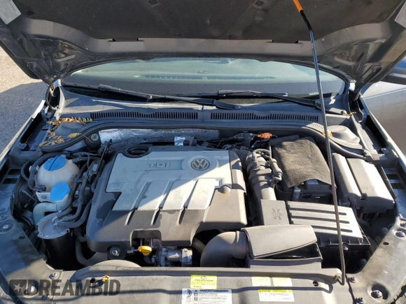 2014 Volkswagen Jetta TDI w/Premium z VIN 3VWLL7AJ8EM385667, wystawiony jako Copart lot #57804065 z przebiegiem 122 020 mil mil oraz Szkoda całkowita • Salvage title. Historia ofert i sprzedaży dostępna na DreamBid. Obrazek 11.
