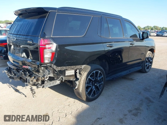 2023 Chevrolet Tahoe RST z VIN 1GNSCRKD3PR365659, wystawiony jako IAAI lot #41975472 z przebiegiem 42 264 mil mil oraz . Historia ofert i sprzedaży dostępna na DreamBid. Obrazek 4.