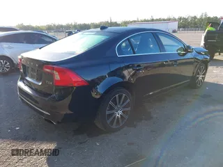 2017 Volvo S60 Inscription with VIN LYV402HK7HB130410, listed as a IAAI auction lot 41751317 with 97,339 mi miles. Bid and sale history available at carsss.com. Image 4.
