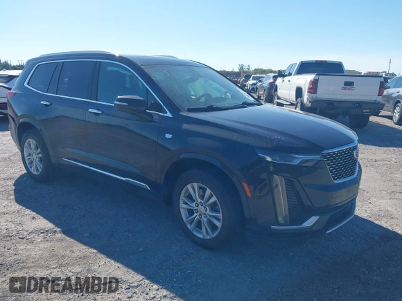 2021 Cadillac XT6 Luxury with VIN 1GYKPAR48MZ171154, listed as a IAAI auction lot 41639465 with 41,183 mi miles. Bid and sale history available at carsss.com. Image 1.