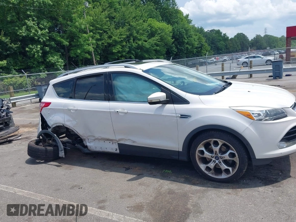 2016 Ford Escape Titanium with VIN 1FMCU9J90GUC48346, listed as a IAAI auction lot 42523307 with 114,265 mi miles and . Bid and sale history available at DreamBid. Image 13.