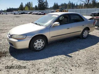 2000 Honda Accord LX z VIN 1HGCG5645YA029887, wystawiony jako Copart lot #53543425 z przebiegiem 114 915 mil mil oraz Szkoda całkowita • Salvage title. Historia ofert i sprzedaży dostępna na DreamBid. Obrazek 1.
