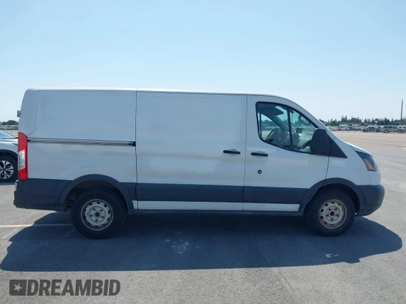 2016 Ford Transit Cargo with VIN 1FTYE1YM5GKB35426, listed as a IAAI auction lot 42402672 with 211,505 mi miles and . Bid and sale history available at DreamBid. Image 13.