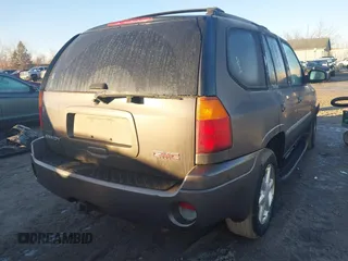 2008 GMC Envoy SLE2 with VIN 1GKDT13S182237645, listed as a IAAI auction lot 41454212 with 195,483 mi miles. Bid and sale history available at carsss.com. Image 4.