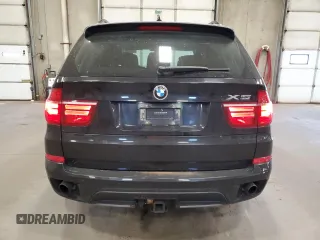 2011 BMW X5 35i z VIN 5UXZV4C52BL743475, wystawiony jako Copart lot #56238615 z przebiegiem 218 738 mil mil oraz Szkoda całkowita • Salvage title. Historia ofert i sprzedaży dostępna na DreamBid. Obrazek 6.