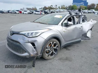 2020 Toyota C-HR LE with VIN JTNKHMBX9L1075101, listed as a IAAI auction lot 42105360 with 1 mi miles. Bid and sale history available at carsss.com. Image 2.