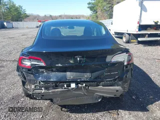 2023 Tesla Model 3 Long Range with VIN 5YJ3E1EB1PF392027, listed as a IAAI auction lot 41983638 with 31,415 mi miles and . Bid and sale history available at DreamBid. Image 15.