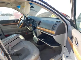 2002 Lincoln Continental with VIN 1LNHM97V22Y672557, listed as a IAAI auction lot 41442390 with 179,198 mi miles. Bid and sale history available at carsss.com. Image 5.