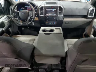 2015 Ford F-150 XLT with VIN 1FTEW1EF8FFA39867, listed as a Copart auction lot 57113965 with 86,807 mi miles and Salvage title. Bid and sale history available at DreamBid. Image 8.