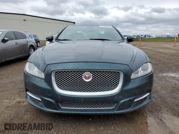 2015 Jaguar XJ Premium Luxury with VIN SAJXJ1CD3F8V88780, listed as a Copart auction lot 57488345 with 62,776 mi miles and Clean Title. Bid and sale history available at DreamBid. Image 5.