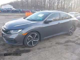 2019 Honda Civic Sport with VIN 2HGFC2F8XKH503867, listed as a IAAI auction lot 41533506 with 66,650 mi miles and . Bid and sale history available at DreamBid. Image 2.
