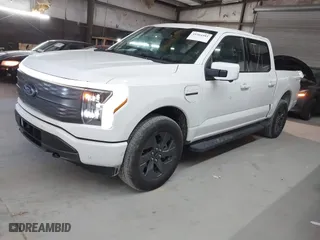2023 Ford F-150 Lightning Pro with VIN 1FT6W1EV5PWG51022, listed as a IAAI auction lot 41364481 with NaN miles. Bid and sale history available at carsss.com. Image 20.