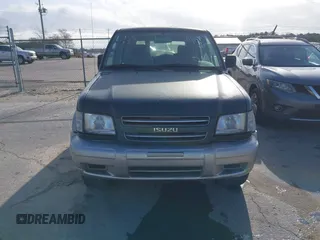 2000 Isuzu Trooper S z VIN JACDS58X9Y7J08094, wystawiony jako IAAI lot #41818546 z przebiegiem 154 927 mil mil oraz . Historia ofert i sprzedaży dostępna na DreamBid. Obrazek 6.