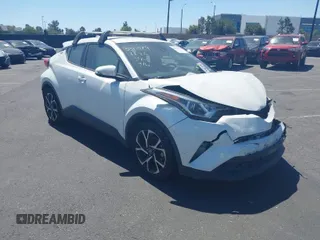 2019 Toyota C-HR XLE with VIN JTNKHMBX4K1040772, listed as a IAAI auction lot 41812031 with 79,729 mi miles. Bid and sale history available at carsss.com. Image 1.