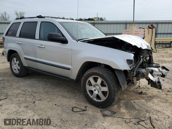 2009 Jeep Grand Cherokee Laredo with VIN 1J8GR48K89C500719, listed as a Copart auction lot 51425085 with 127,896 mi miles and Salvage Title. Bid and sale history available at carsss.com. Image 4.